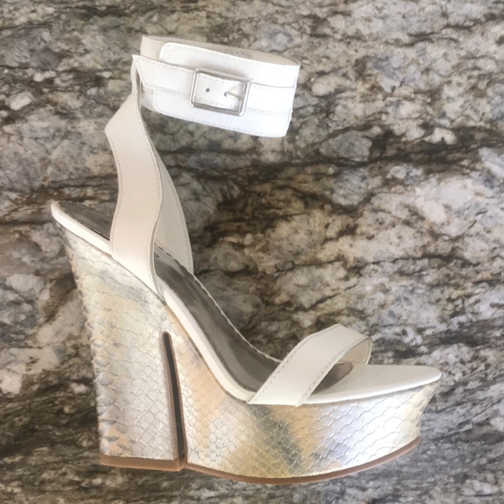 White/snakeskin bebe wedges